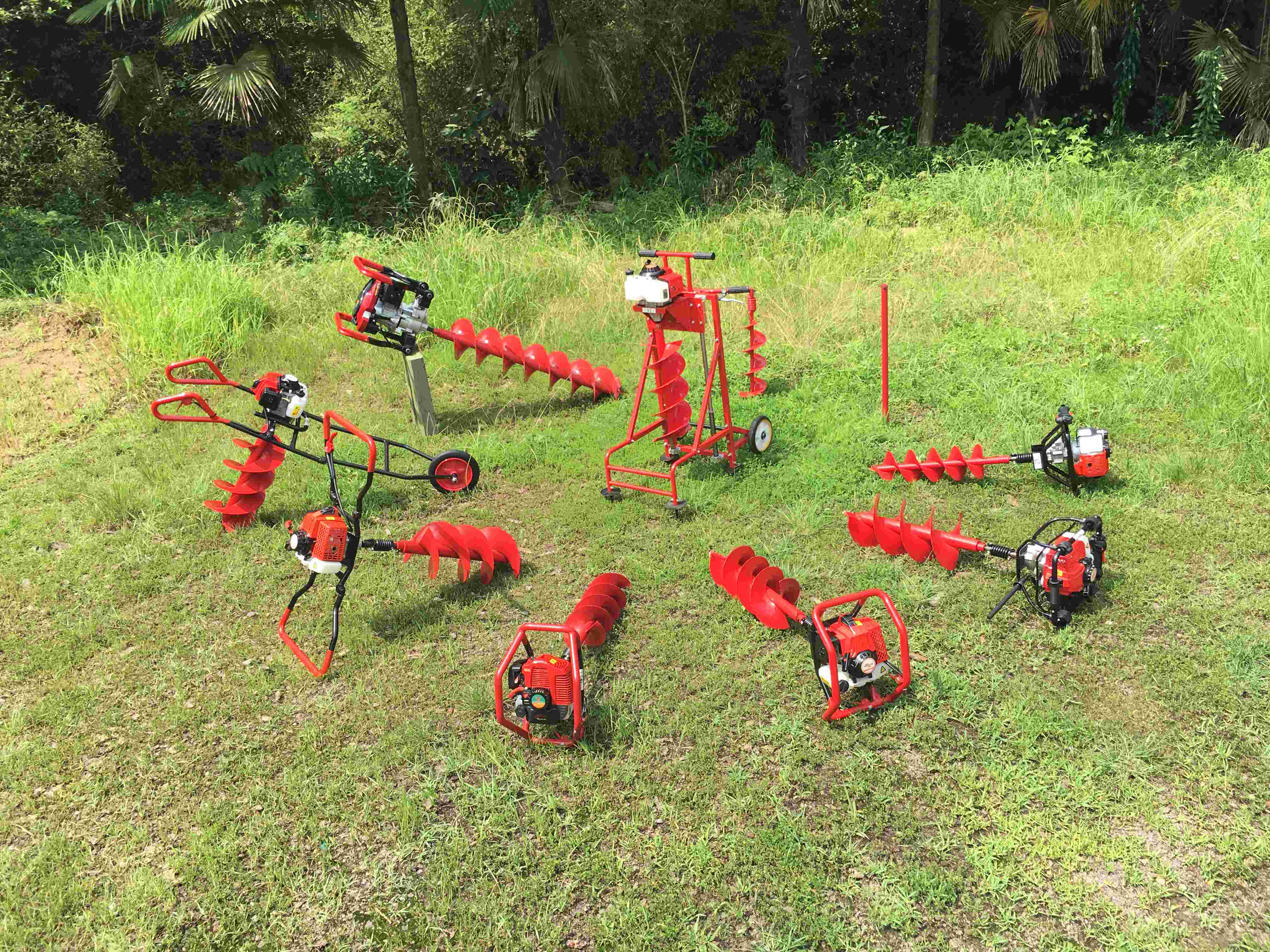 What is the difference between an earth auger and a standard drill